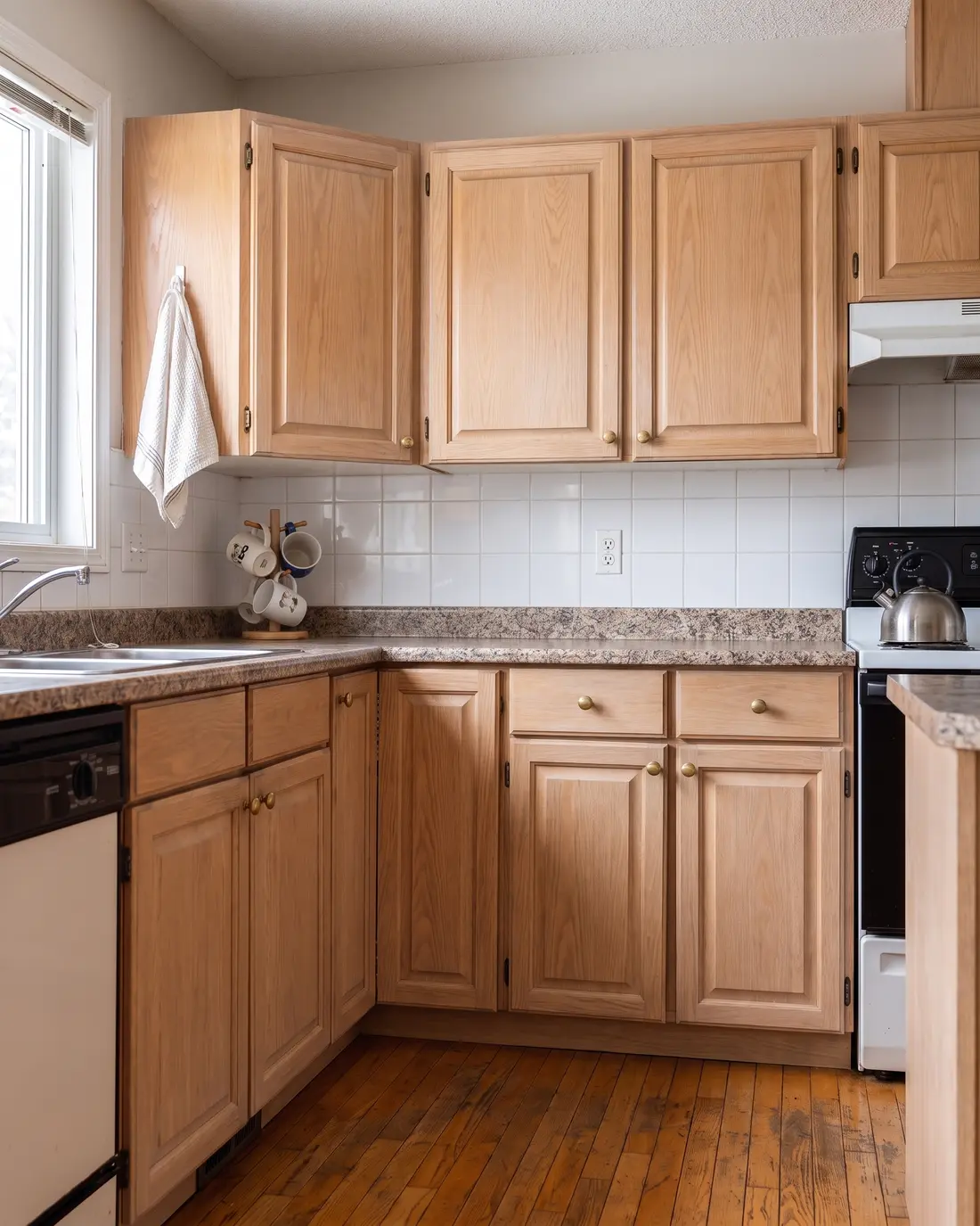 Solid oak cabinets refinished in a light natural stain with the grain showing, concept render